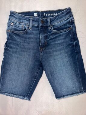 GAP High Rise Bermuda Denim Shorts in Medium Blue.